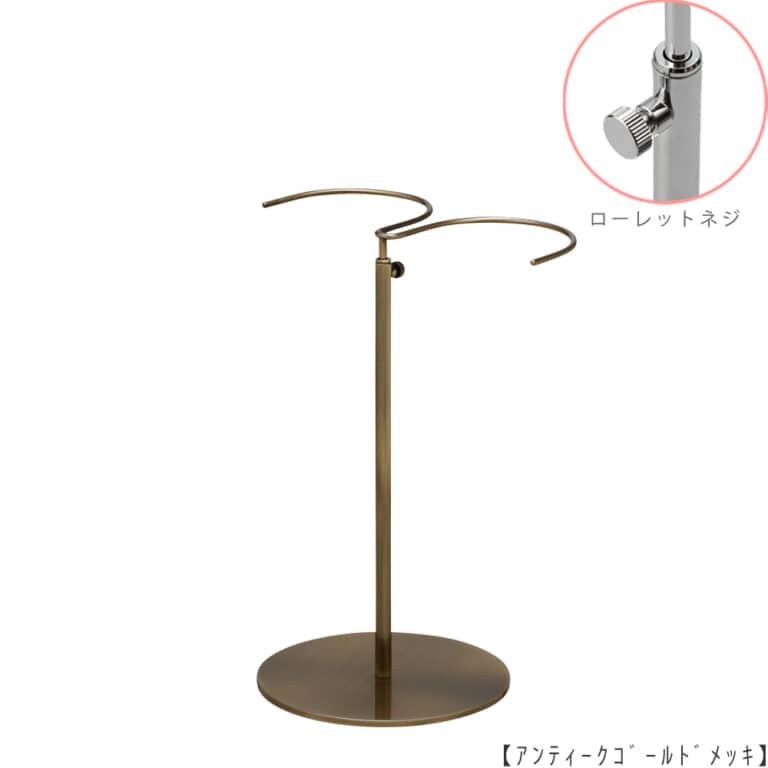●商品名:ブーツスタンド両足用 ローレットネジ仕様
●表面処理:アンティークゴールド(AG)仕上
●寸法:高さ275~450mm
●ヘッド:上下可動式(伸縮式)
●材質:スチール
●特長:スタンドを目立たせずロングブーツをディスプレイできます。
●生産国:日本(タヤ自社工場)
