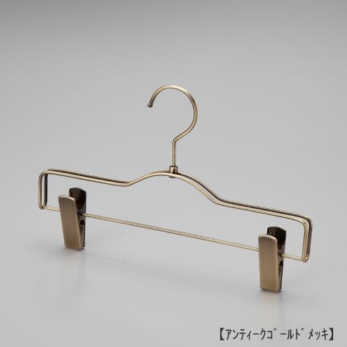 スカート、パンツ用ボトムハンガー/型番:BS-500R/表面処理:ゴールドメッキ仕上/材質:スチール製/フック:回転式/クリップ:横へスライド移動させずに使用してください。/デザイン:ダブルラインを使用することによりハンガーにボリュームが生まれ、高級感があります。/原産国:日本製
